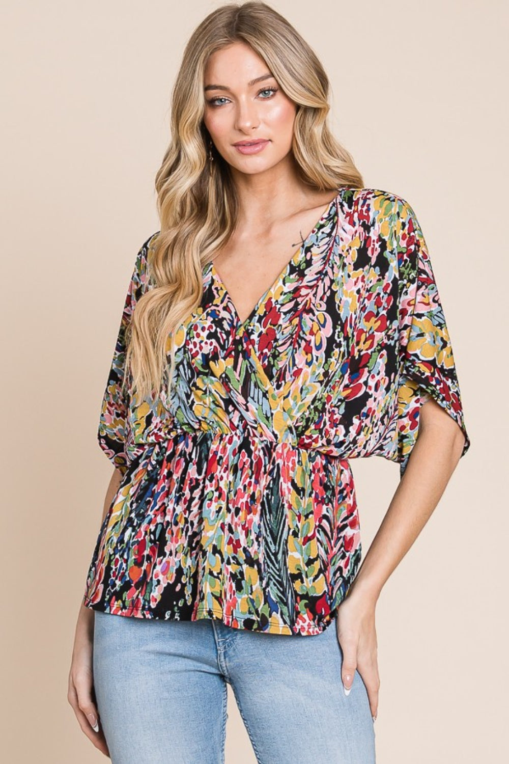 Printed Surplice Peplum Blouse