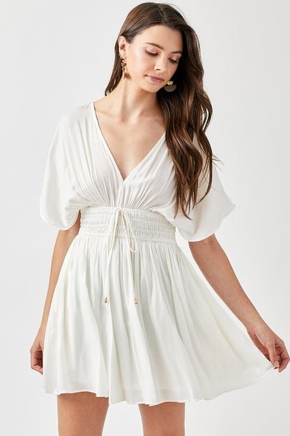 SMOCKED WAIST WITH TASSEL STRAP DRESS