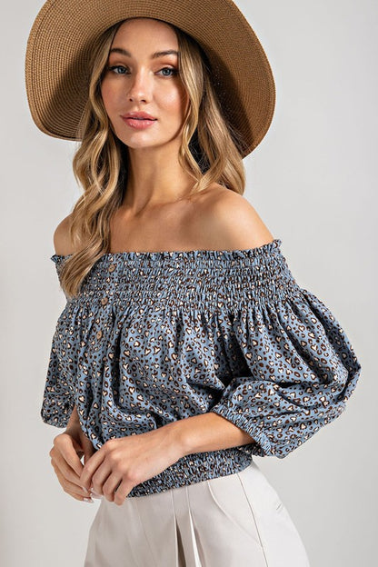 ANIMAL PRINT SMOCKED OFF THE SHOULDER TOP