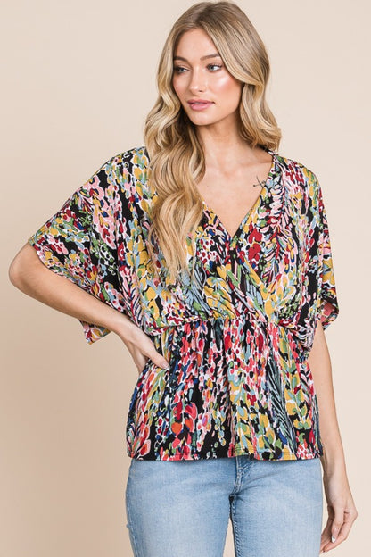 Printed Surplice Peplum Blouse