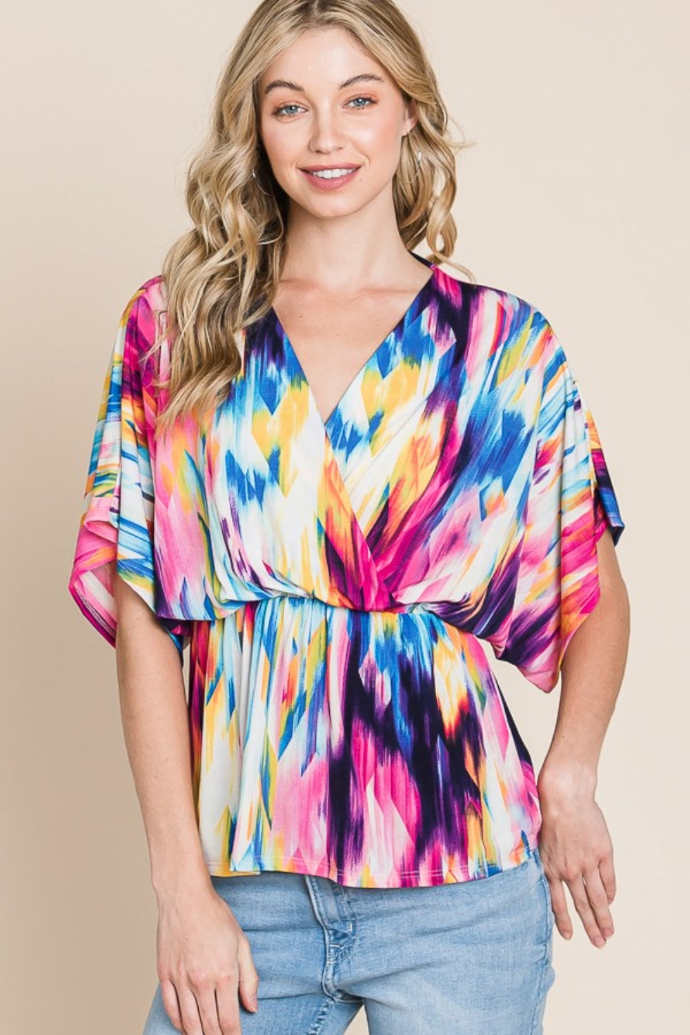 Printed Surplice Peplum Blouse