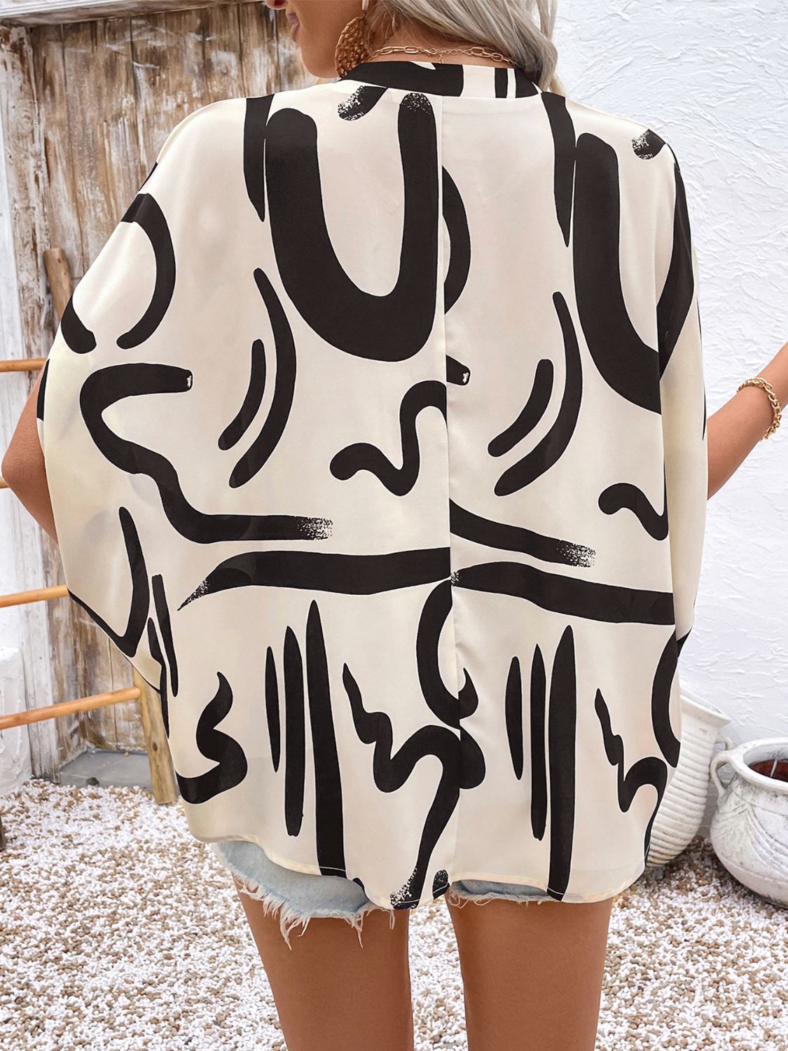 Printed Notched Half Sleeve Blouse