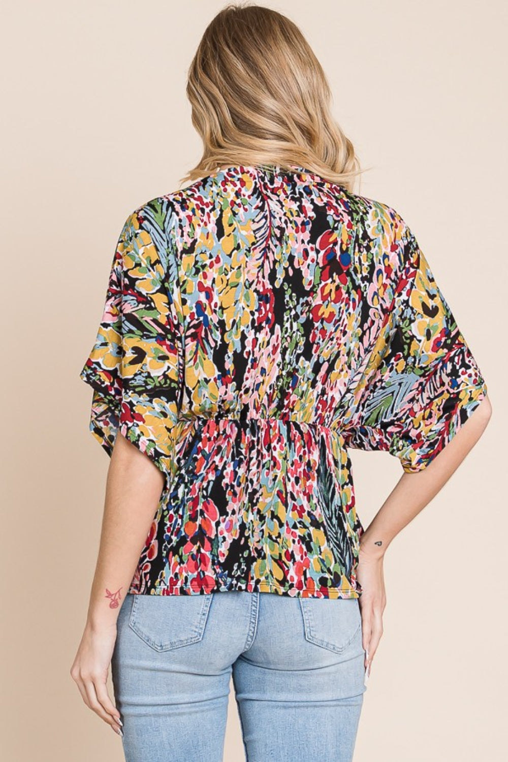 Printed Surplice Peplum Blouse