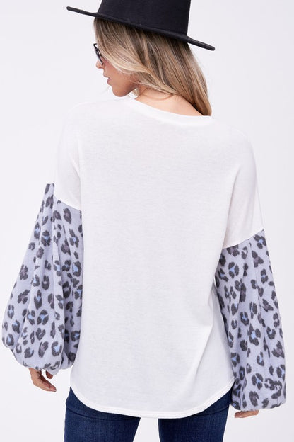 PLUS ANIMAL PRINT MIXED VOLUME SLEEVE TOP