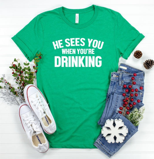 He Sees You When Your Drinking Graphic Tee