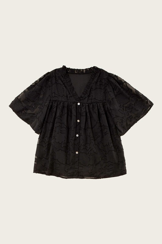 A line blouse with ruffle trim