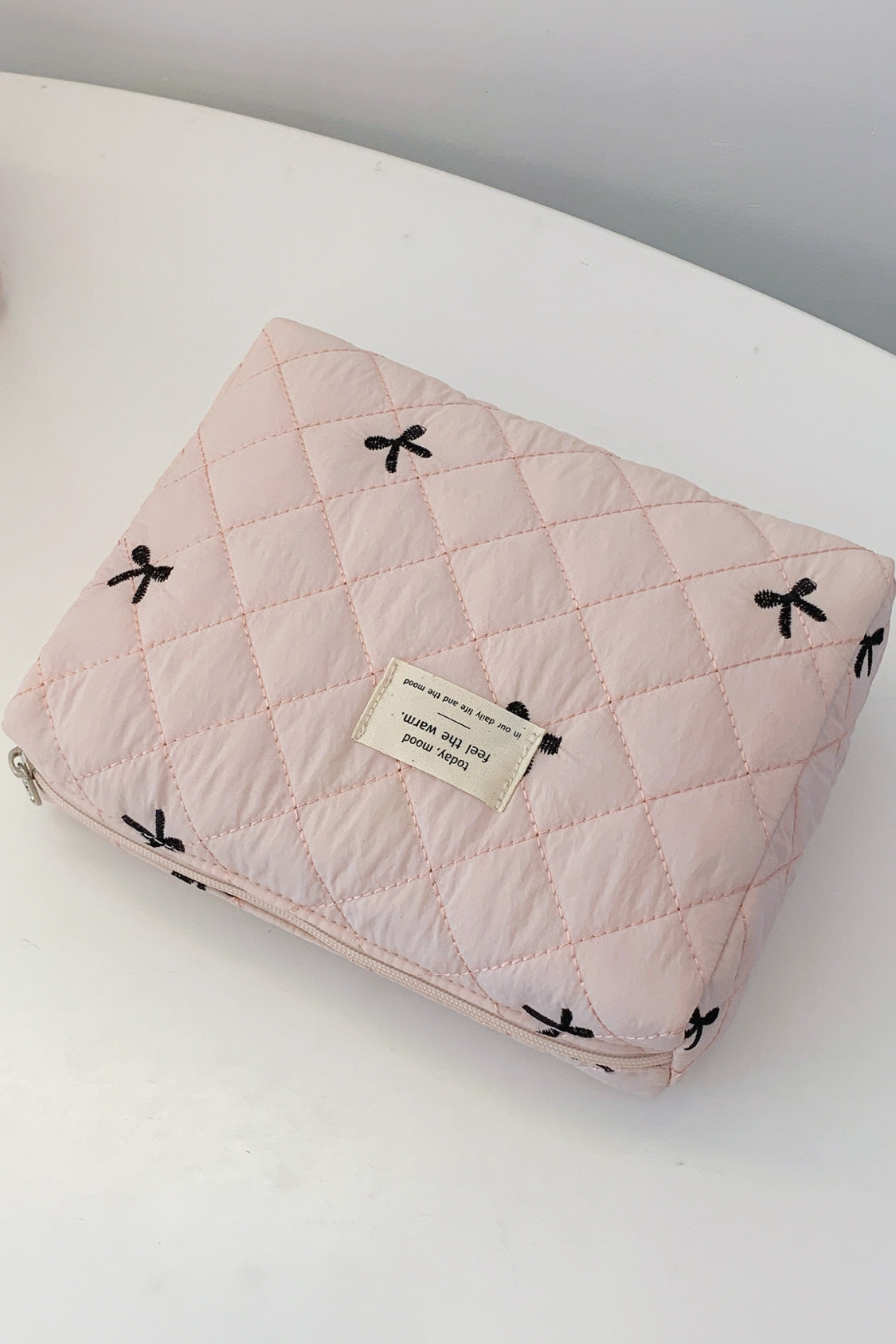 Bow Embroidered Quilted Storage Bag