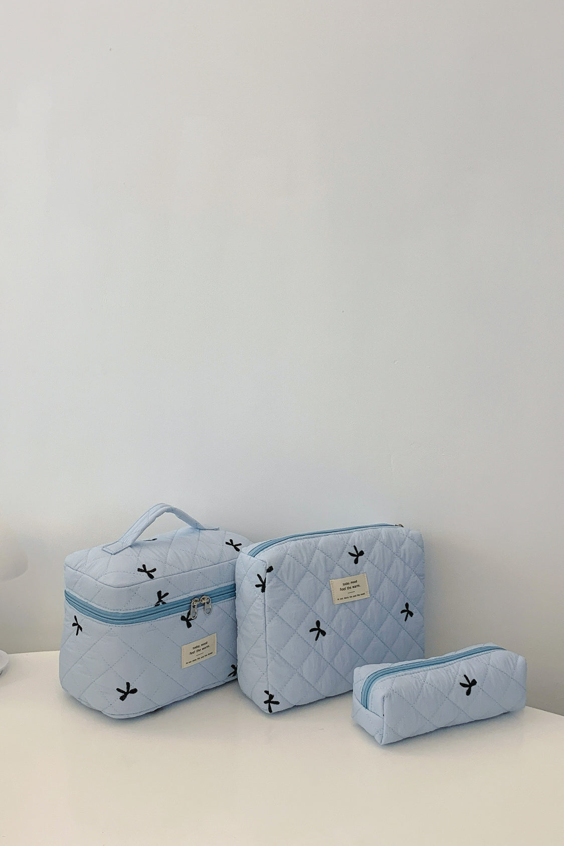 3 Piece Bow Quilted Cloth Storage Bag Set