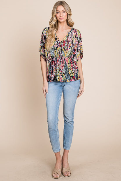 Printed Surplice Peplum Blouse