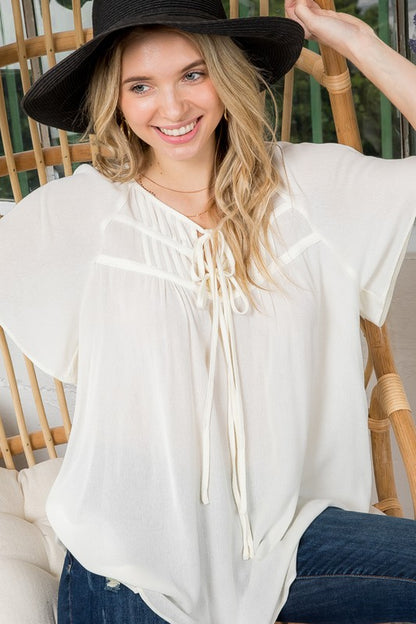 PLUS SOLID BOW TIE PEASANT TOP