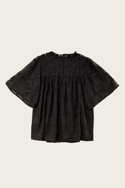 A line blouse with ruffle trim