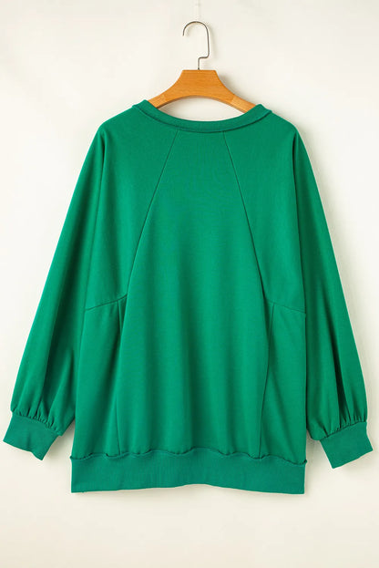 Cutout Hem Notched Long Sleeve Sweatshirt