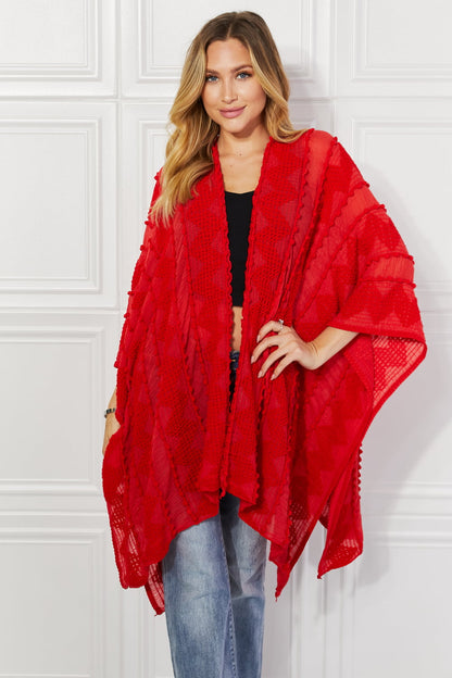 Pom-Pom Asymmetrical Poncho Cardigan in Red